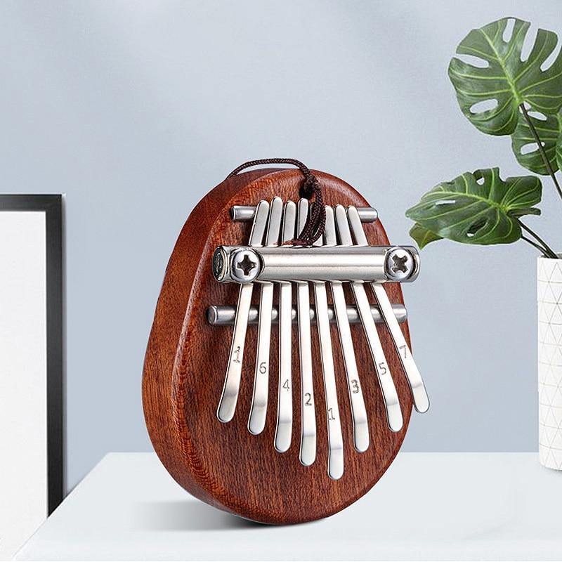 8 Key Mini Kalimba Exquisite Finger Thumb Piano - NewDayTrends